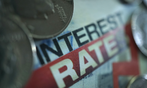 How Falling Interest Rates Could Boost ASX 200 Stocks in 2025